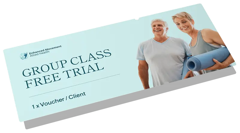 A voucher featuring a smiling older man and woman in workout clothes, with the woman holding a yoga mat. Text reads: Enhanced Movement Allied Health. Group Class Free Trial. 1 x Voucher / Client.
