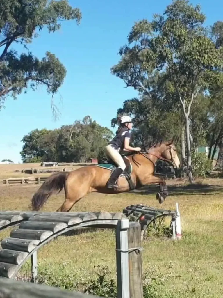 Bailey white emep client experience officer horse jumping skye